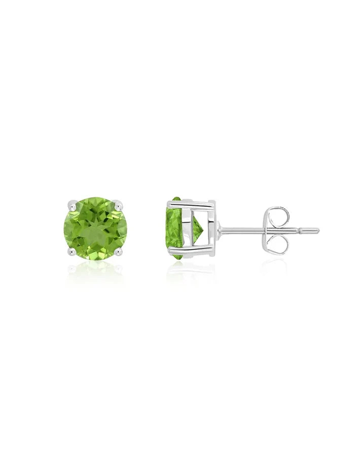 Pair of green gemstone stud earrings on a white background
