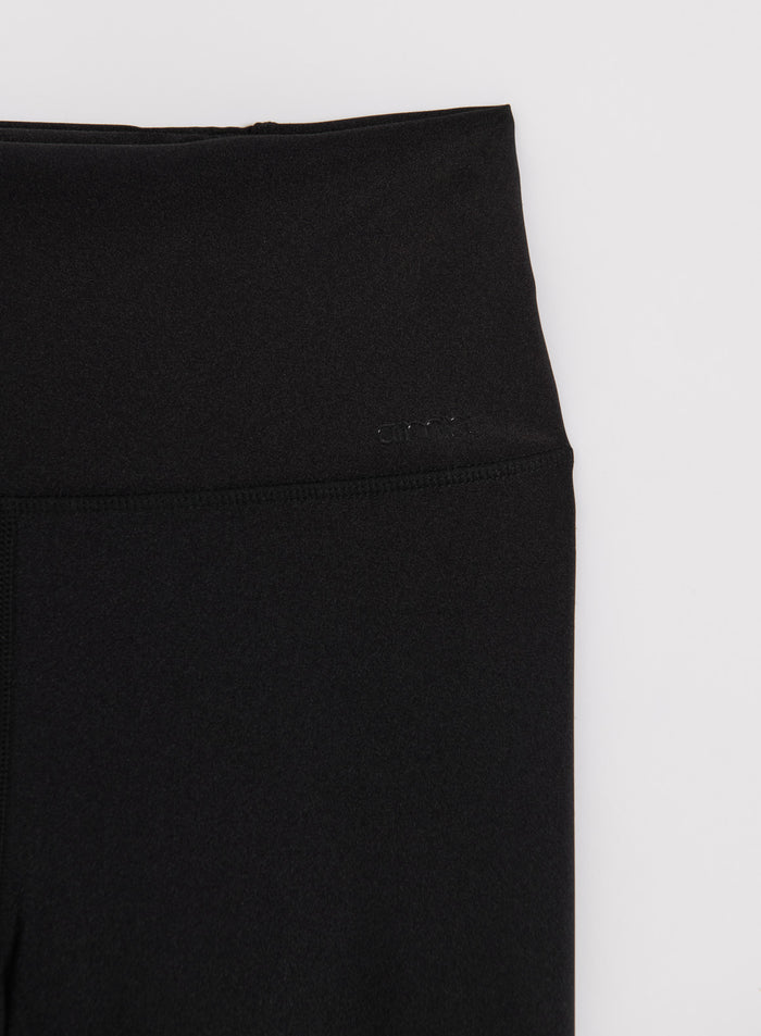 Black Shimmer Tights from aim'n with a high-rise waistband and subtle tonal logo detail.