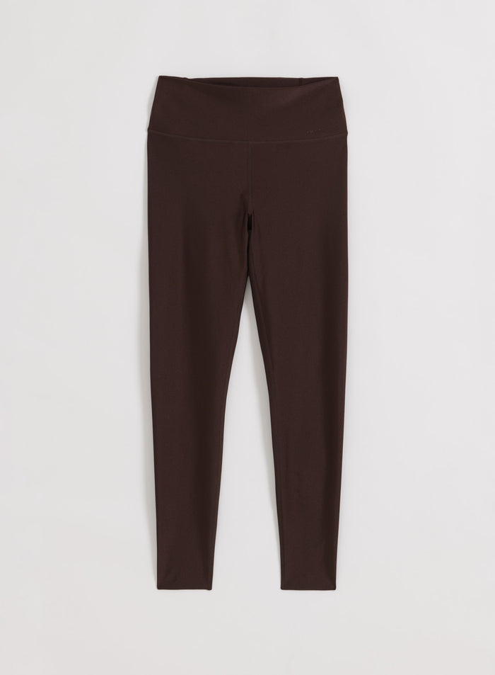 High-waisted Shimmer Tights in chocolate brown by aim'n, presented in a clean flat lay view.