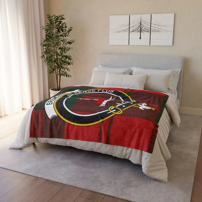 Erskine clan crest throw blanket draped over sofa — full-colour tartan print, white reverse
