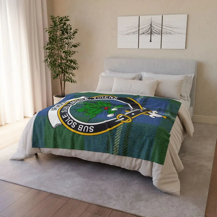 Clan Irvine throw blanket — draped view showing full tartan and clan crest print, hemmed edges