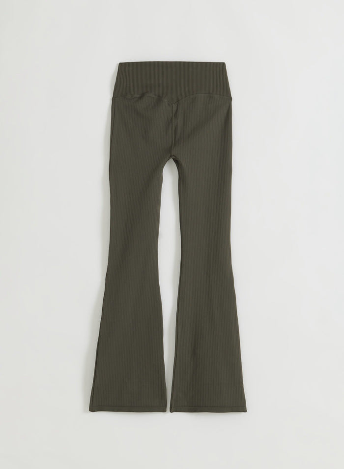 Dark ivy ribbed seamless flare tights with a high waist, shown in a flatlay