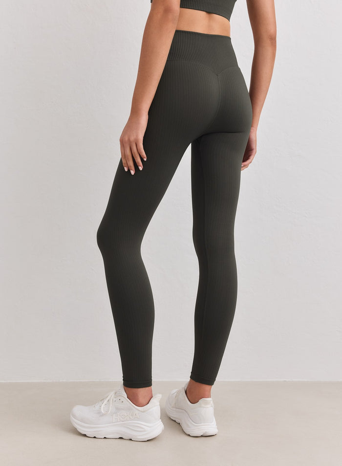 Dark ivy ribbed seamless tights by aim'n featuring a high waist and second skin feel. [S-178cm]
