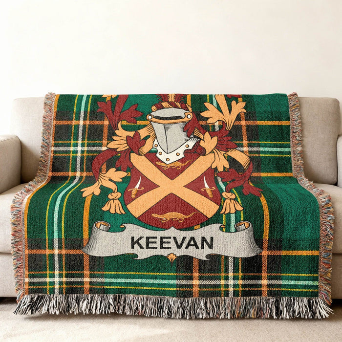 Keevan family crest on an Irish National Tartan woven cotton throw.