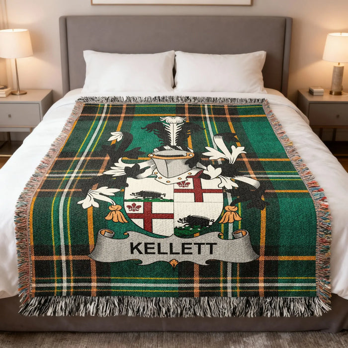 Kellett Irish family crest woven blanket displayed on a bed.