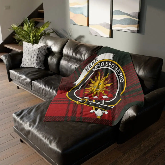 Kerr printed throw blanket on sofa with sun crest