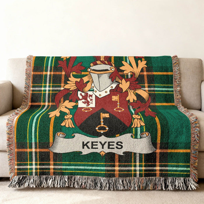 Keyes family crest on an Irish National Tartan woven cotton throw.