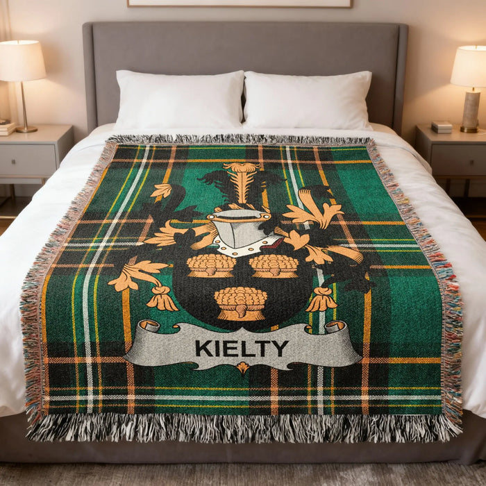 Kielty tartan throw blanket with the Kilty coat of arms.