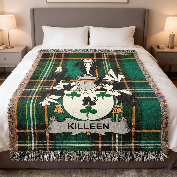 Killeen Irish family crest woven blanket displayed on a bed.