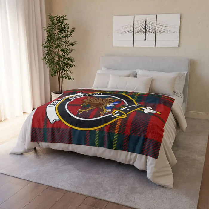 Leslie clan crest tartan throw blanket on sofa — lightweight 100% polyester with clan design