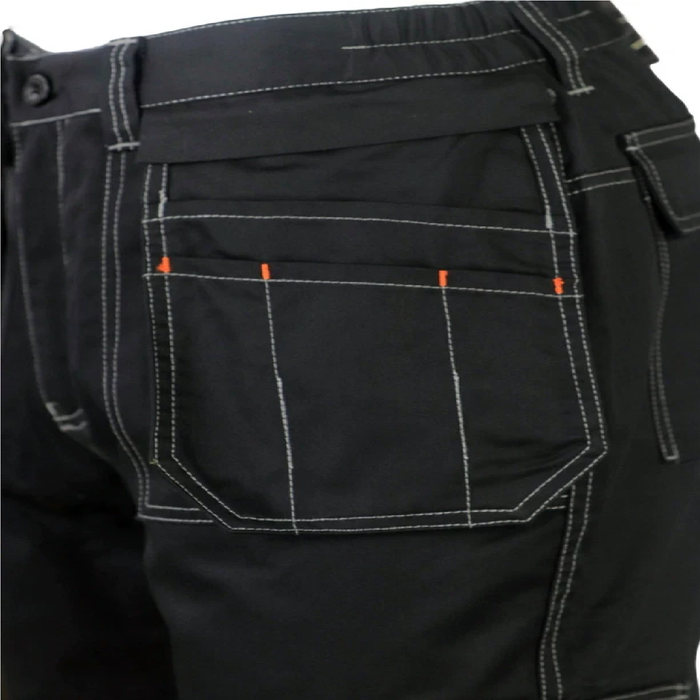 Close-up of black pants with orange accents on a white background