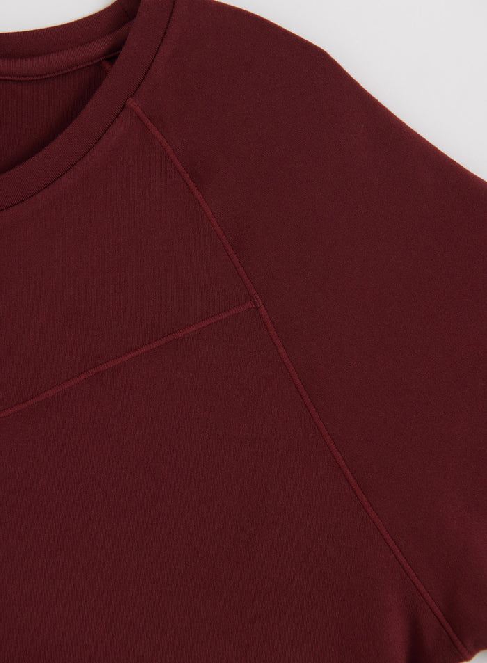 Merlot Soft Basic Short Sleeve by aim'n, featuring a round neckline and close-up stitching on soft jersey fabric.