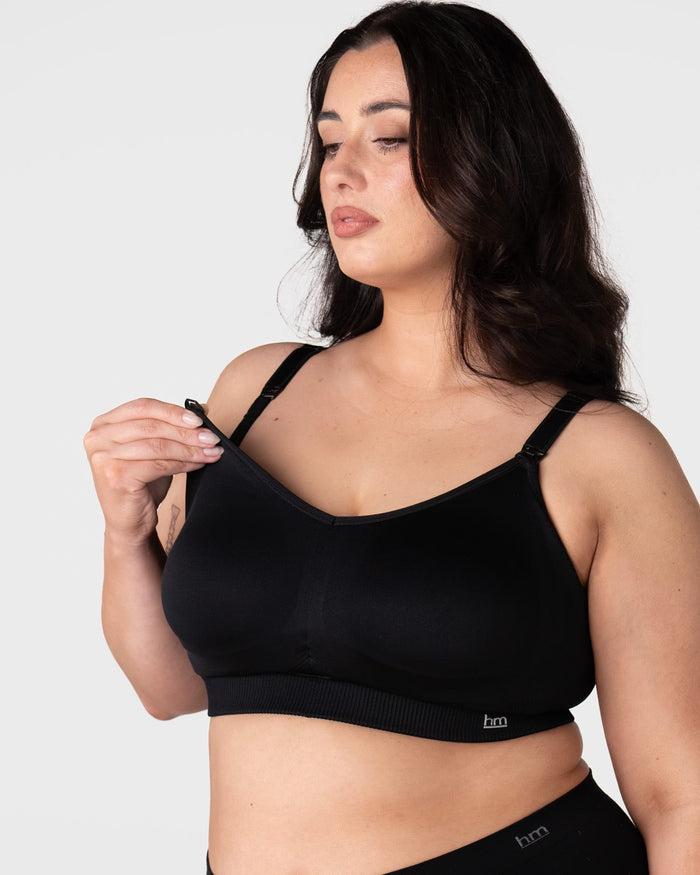 Model demonstrating nursing clip release on the Hotmilk My Everyday FlexFit Nursing Bra in Black Busty – showing one-handed breastfeeding access
