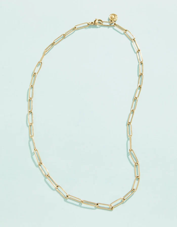 A gold-colored necklace with a chain link design, featuring a lobster clasp closure.